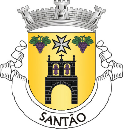 Escudo de ouro, torre sineira de negro, lavrada de prata e aberta do campo, com dois sinos de púrpura; em chefe, cruz da Ordem de Malta, de prata, perfilada de negro, entre dois cachos de uvas de púrpura, folhados de verde. Coroa mural de prata de três torres. Listel branco, com a legenda a negro: «SANTÃO». 