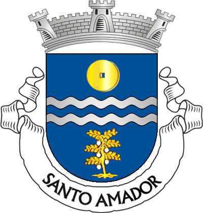 Escudo de azul, faixa ondada de prata, carregada de uma burela ondada de azul, acompanhada em chefe de mó de moinho de ouro, aberta do campo e, em ponta, de um pé de grão de bico arrancado, de ouro, frutado de prata. Coroa mural de prata de três torres. Listel branco, com a legenda a negro: «SANTO AMADOR». 