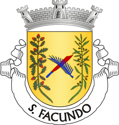 Escudo de ouro, palma de azul e agomia de vermelho, encabada de azul, passadas em aspa, entre ramo de sobreiro de verde, landado de vermelho, com casculhos de verde, à dextra e ramo de oliveira do mesmo, frutado de negro, à sinistra. Coroa mural de prata de três torres. Listel branco, com a legenda a negro: «S. FACUNDO». 