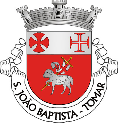 Escudo de vermelho, Agnus Dei, de prata com lábaro do mesmo, carregado de uma cruz firmada de vermelho e haste de ouro; chefe de prata, carregado das cruzes da Ordem dos Templários e da Ordem de Cristo. Coroa mural de prata de três torres. Listel branco com a legenda de negro, em maiúsculas : “ S. JOÃO BAPTISTA – TOMAR “.