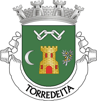 Escudo de verde, torre de ouro lavrada de negro, aberta e iluminada de vermelho, entre um crescente voltado, de prata, à dextra e um ramo de oliveira de prata, frutado de ouro, à sinistra; emchefe, cinco elos de corrente de prata, dispostos o 1º e 4º em banda, o 2º e 5º em barra e o 3º em faixa. Coroa mural de prata de quatro torres. Listel branco, com a legenda a negro: «TORREDEITA».