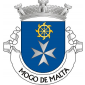 Escudo de azul, cruz da Ordem de São João de Jerusalém, dita de Malta; em chefe, roda de navalhas de ouro. Coroa mural de prata de três torres. Listel branco, com a legenda a negro: «MOGO de MALTA».