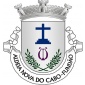 Escudo de prata, Cruz de Calvário de azul; em campanha, uma lira de púrpura entre dois ramos de oliveira de verde, frutados de negro e passados em aspa no pé. Coroa mural de prata de três torres. Listel branco, com a legenda a negro: «ALDEIA NOVA DO CABO - FUNDÃO». 