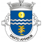 Escudo de azul, faixa ondada de prata, carregada de uma burela ondada de azul, acompanhada em chefe de mó de moinho de ouro, aberta do campo e, em ponta, de um pé de grão de bico arrancado, de ouro, frutado de prata. Coroa mural de prata de três torres. Listel branco, com a legenda a negro: «SANTO AMADOR». 