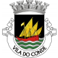 Escudo de negro, com uma caravela de vermelho, vestida, mastreada, encordoada, realçada e com âncora de ouro, vogante num mar composto de sete faixas ondadas de prata e verde. Coroa mural de prata de cinco torres. Listel branco com a legenda a negro : " VILA DO CONDE ".