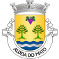 Escudo de ouro, cacho de uvas de púrpura folhado de verde e dois pinheiros arrancados de verde, frutados do campo, tudo disposto em roquete; campanha ondada de azul e prata de três tiras. Coroa mural de prata de três torres. Listel branco, com a legenda a negro: «ALDEIA do MATO». 