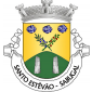 Escudo de ouro, ramo de oliveira de negro, folhado de verde e frutado de azul e ramo de castanheiro de negro, folhado de verde e florido de vermelho, passados em aspa; em chefe, três pedras de azul, realçadas de prata, dispostas em faixa e, em ponta, monte de verde carregado de dois marcos miliários de prata postos em pala e alinhados em faixa. Coroa mural de prata de tês torres. Listel branco, com a legenda a negro: «SANTO ESTEVÃO - SABUGAL».