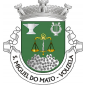 Escudo verde, balança de ouro sustida por espada de lâmina flamejante de prata, empunhada de ouro, acompanhada em chefe por uma bigorna e uma lira e, em ponta, por uma mata, tudo de prata.
Coroa mural de prata de três torres, Listel branco, com a legenda a negro: «S. Miguel do Mato — Vouzela».