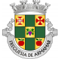 Escudo equipolado de ouro e verde, com os pontos de ouro carregados de cruz de Cristo, cruz orbicular templária de vermelho, cacho de uvas de púrpura folhado de verde, maçã de vermelho folhada de verde e maçã de vermelho folhada de verde. Coroa mural de prata de quatro torres. Listel de prata com legenda em letras a negro maiúsculas "Freguesia de Armamar".