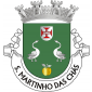 Escudo de verde, dois gansos de prata, animados de vermelho, realçados de negro e afrontados; em chefe, escudete de prata, carregado com a cruz da Ordem de Cristo e, em ponta, uma maçã de ouro, folhada de prata. Coroa mural de prata de quatro torres. Listel branco, com a legenda a negro: «S. MARTINHO das CHÃS». 